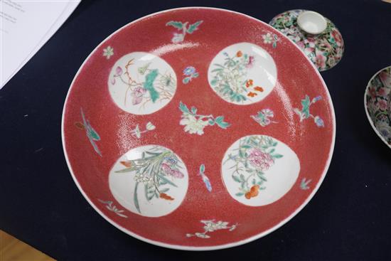 A Chinese ruby ground famille rose dish, early 20th century and a rice bowl, cover and stand